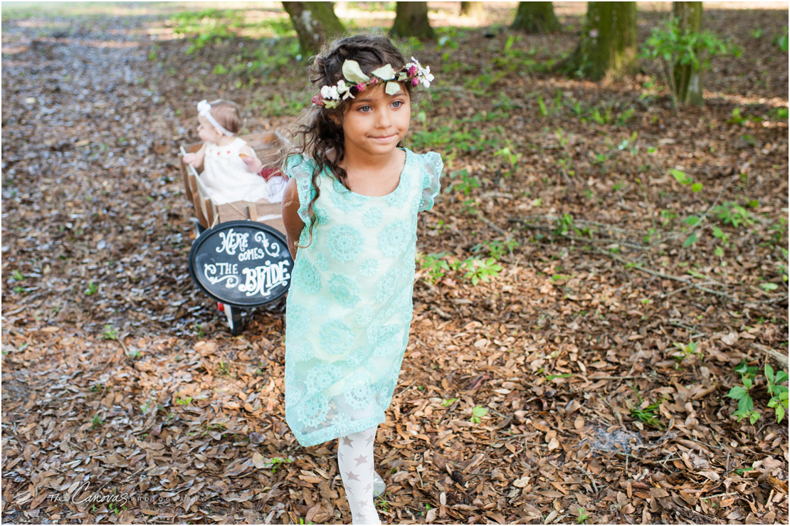 little girl and wagon with baby