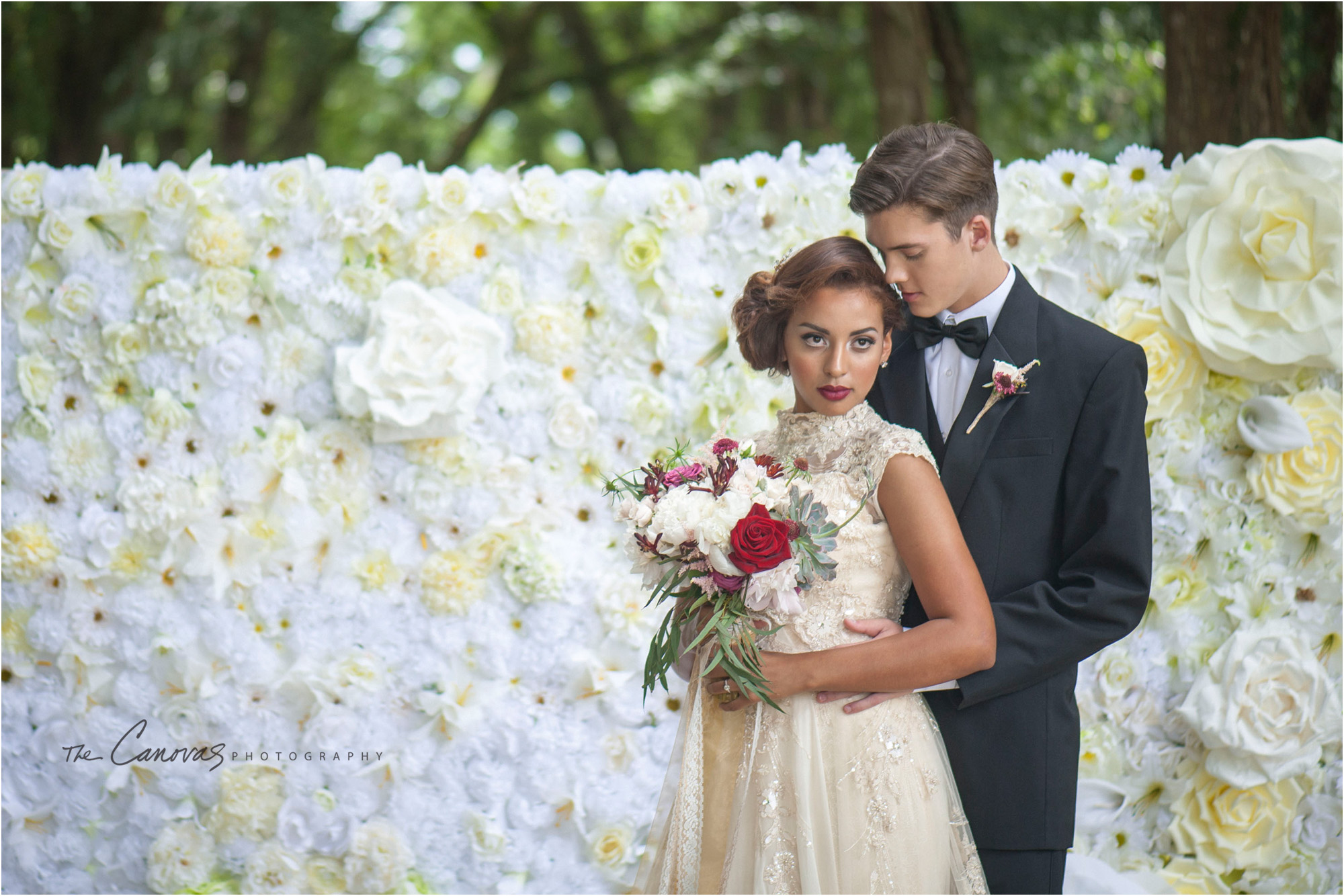 bride and groom flower wall