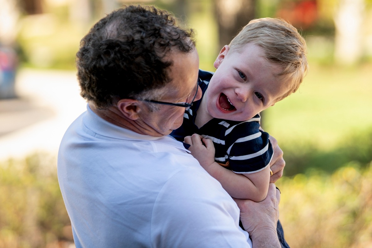 Extended family photography session by Orlando family photographer at a vacation home in Kissimmee, Florida