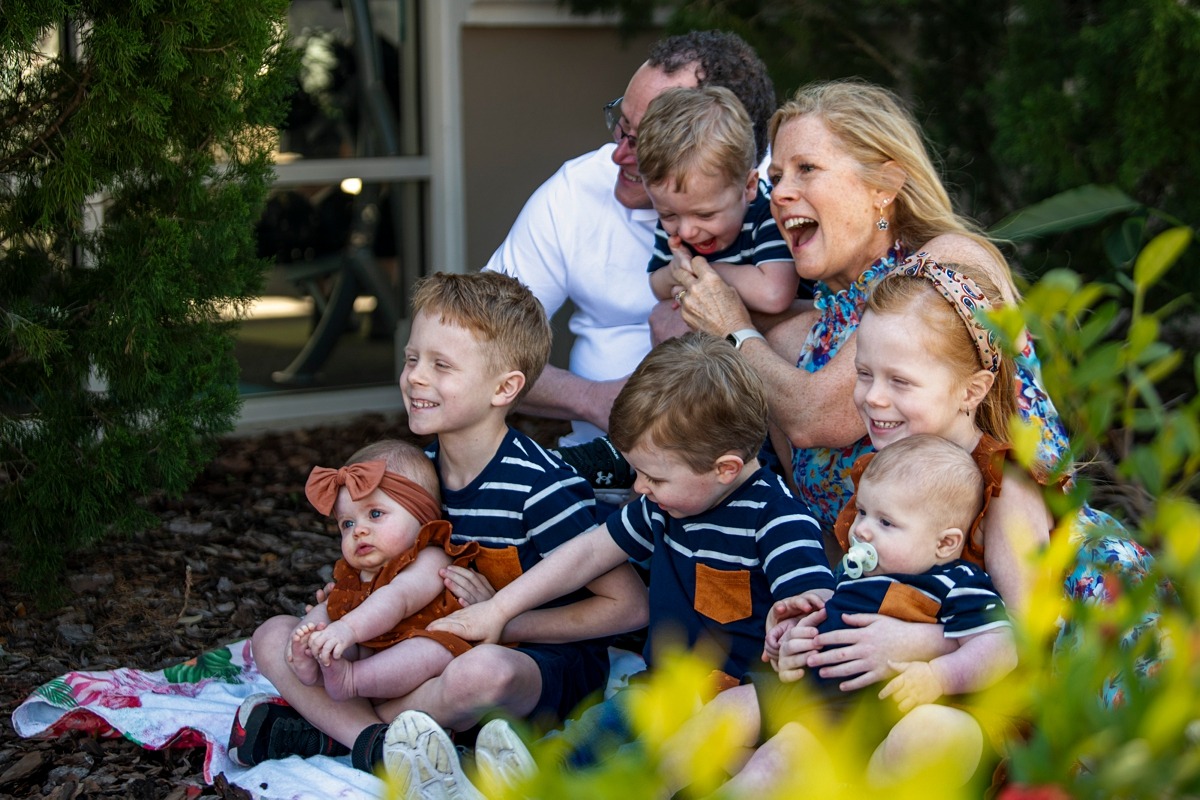 Extended family photography session by Orlando family photographer at a vacation home in Kissimmee, Florida