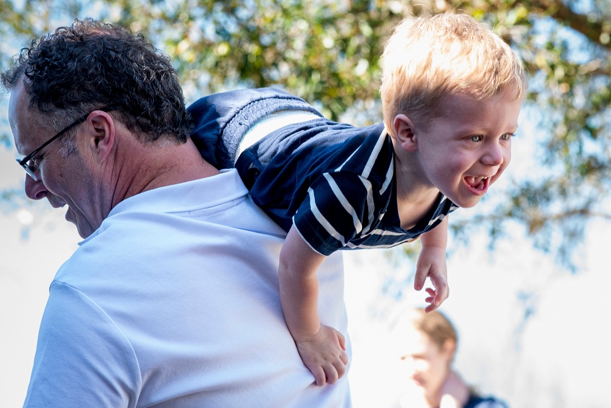 Extended family photography session by Orlando family photographer at a vacation home in Kissimmee, Florida