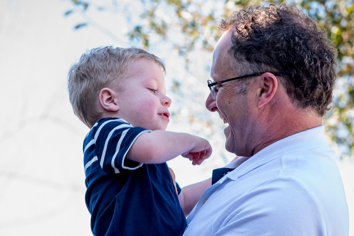 Extended family photography session by Orlando family photographer at a vacation home in Kissimmee, Florida