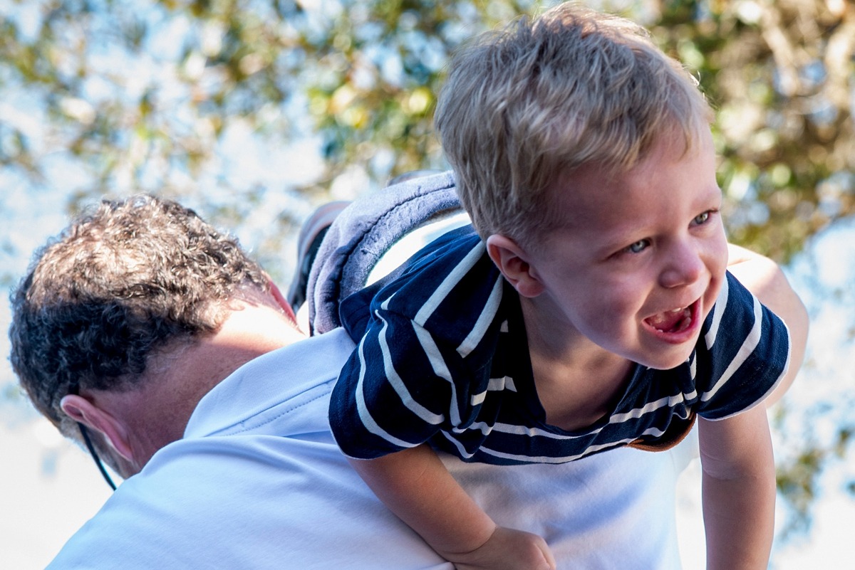 Extended family photography session by Orlando family photographer at a vacation home in Kissimmee, Florida